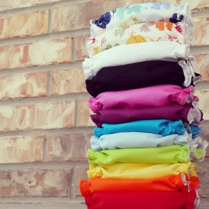 A stack of Applecheeks cloth diapers